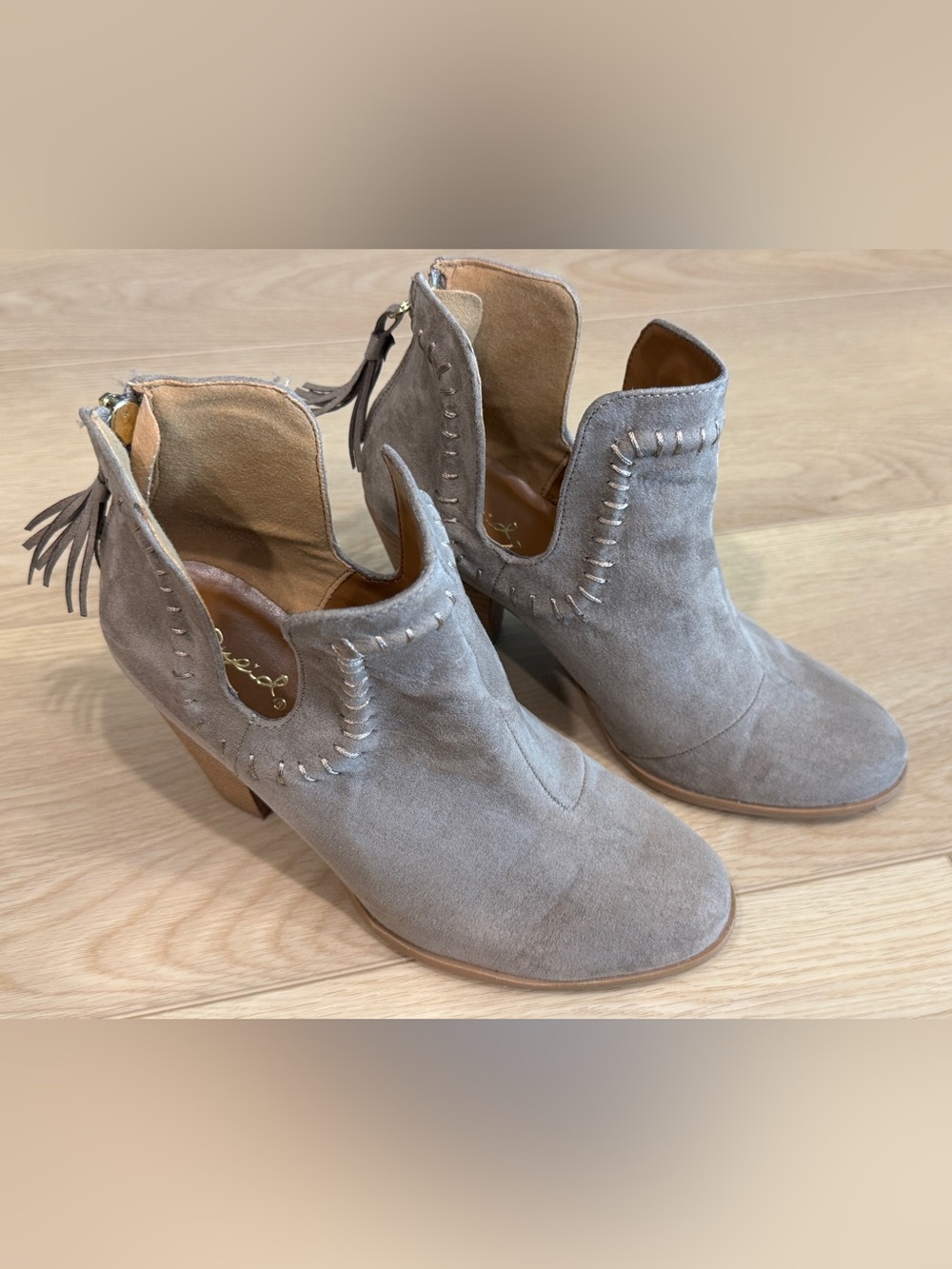 Qupid Gray Taupe Suede Tassel Cutout Ankle Booties